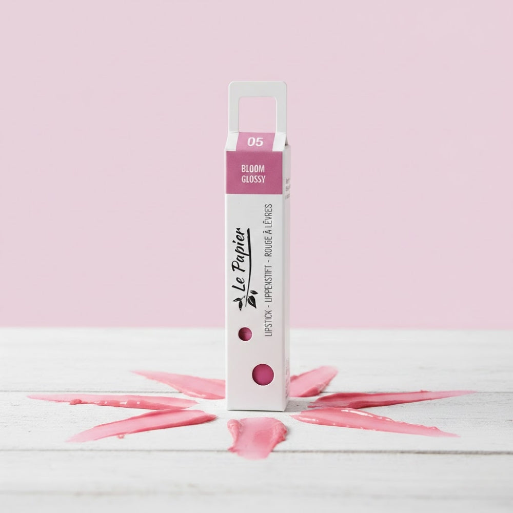 Glänzender Lippenstift BLOOM 05 GLOSSY in Papertube von BeautyMadeEasy, mit schimmernder Textur und eleganter Verpackung.