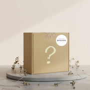 B-Ware Mystery-Box von BEN&ANNA mit verschiedenen Überraschungsartikeln, sichtbare Inhalte in der Box, dekorative Verpackung