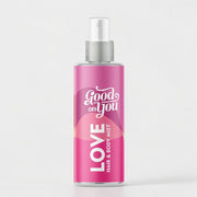 Sprühflasche des LOVE Hair & Body Mist von Good on You mit floral gestalt auf weißem Hintergrund.