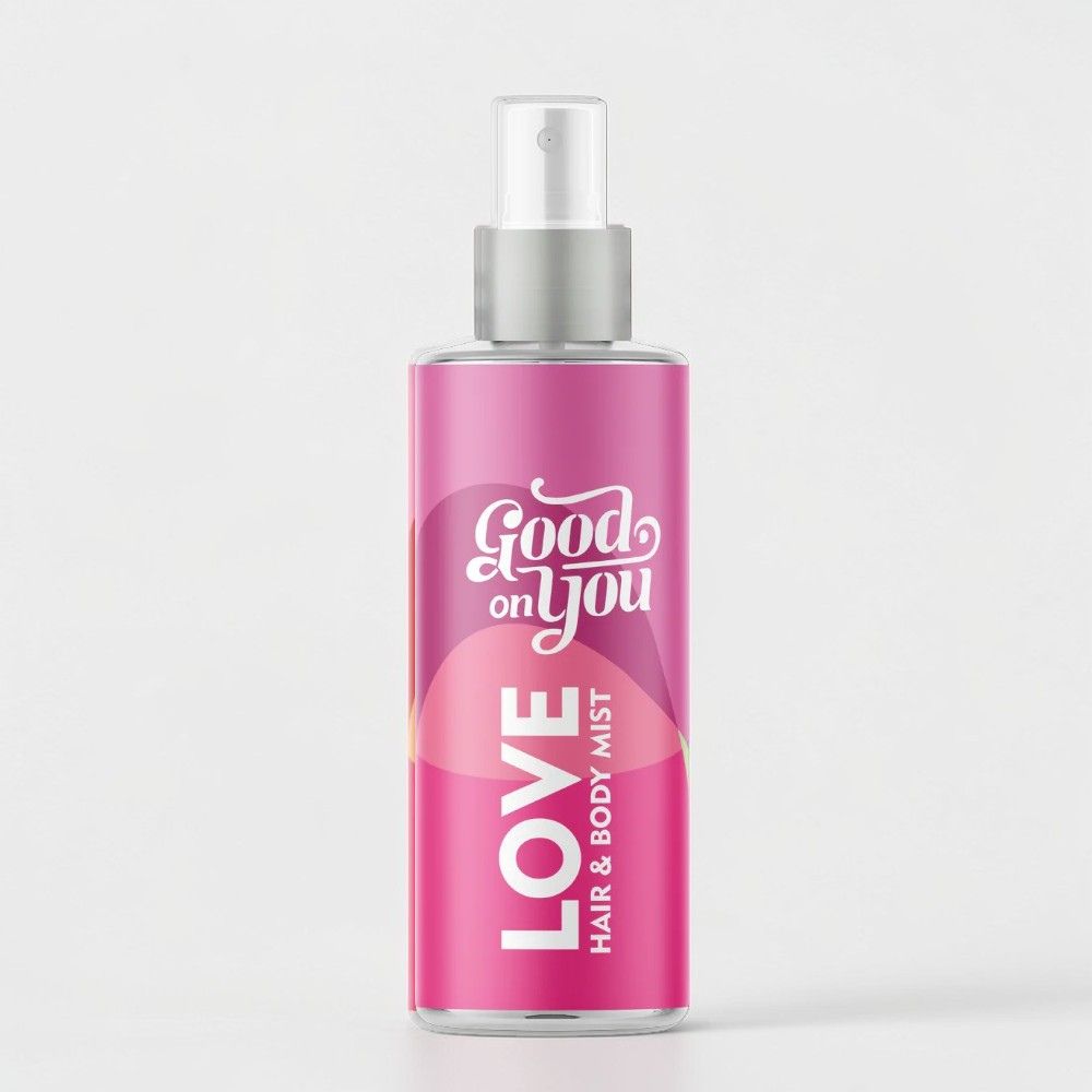 Sprühflasche des LOVE Hair & Body Mist von Good on You mit floral gestalt auf weißem Hintergrund.