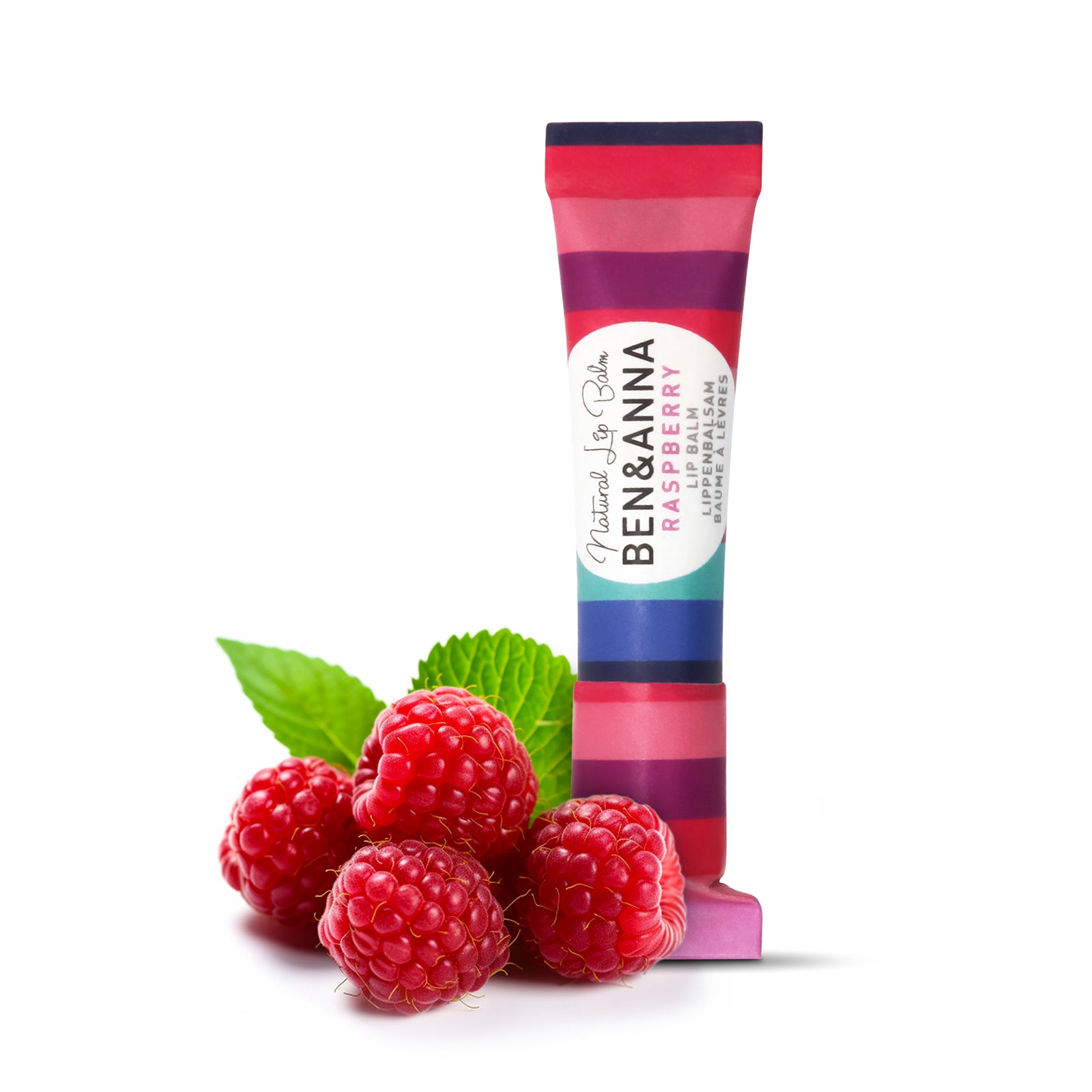 Natürlicher Lippenbalsam Raspberry von BEN&ANNA in Stickform, vertikal mit roter Himbeere und pflegender Textur.